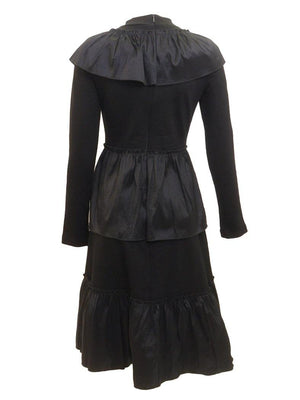 Back view of black tiered taffeta dress